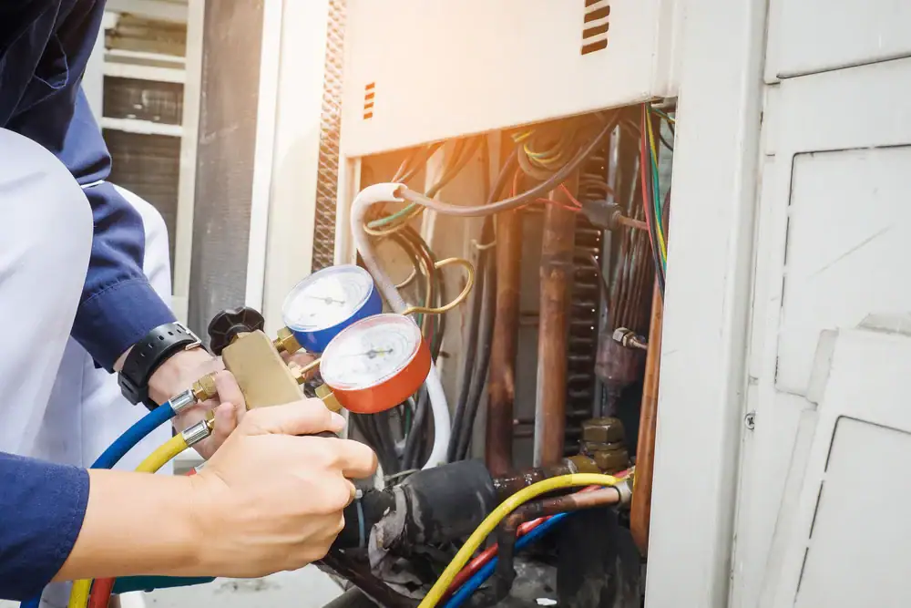 Technician Inspecting Ac Unit Greater Bridgeport Planning Region Connecticut_2
